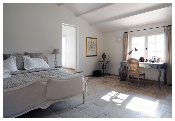 Lofty second-floor master bedroom.